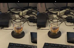 stereo image pair, tea in a double-wall espresso cup on a wireless charging pad in front of a deskful of various USB and power cords