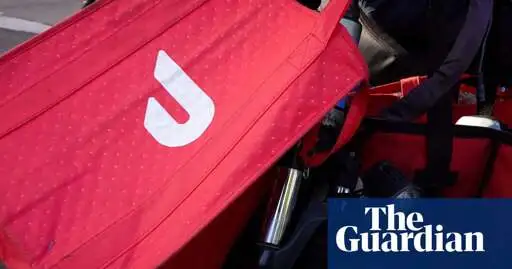 US town official who shot DoorDash driver feared home invasion, lawyers say