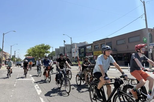 Protesters call for boycott of businesses suing city over Bloor St. bike lane