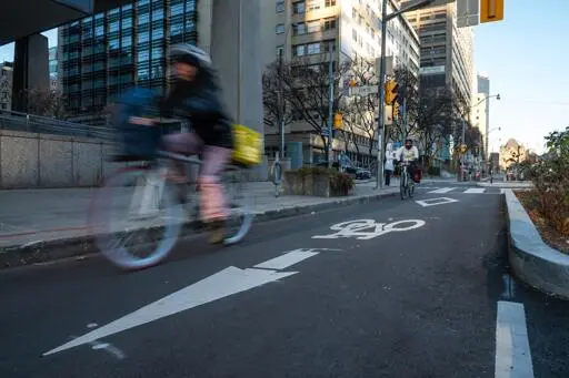 Toronto protesters demand engineering firm cancel bike lane removal contract with Ontario