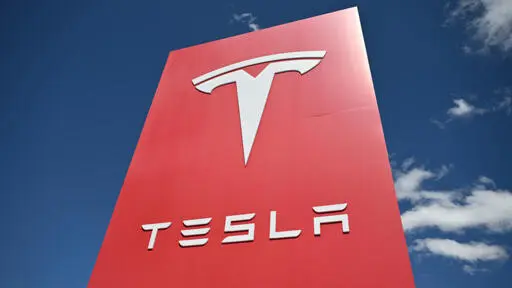 Tesla sales in Europe almost halve amid anger against Musk