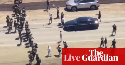 Federal officers use force on protesters during immigration raids at California farms – as it happened