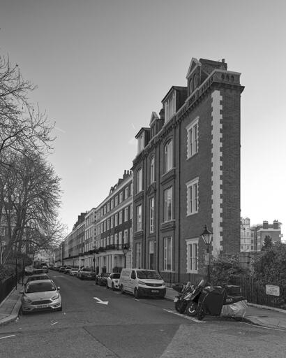 An apparently improbably shallow row house at the end of a residential street.
