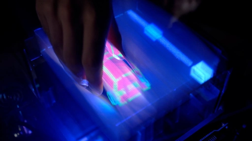 A new 3-D display lets you reach in and touch virtual objects