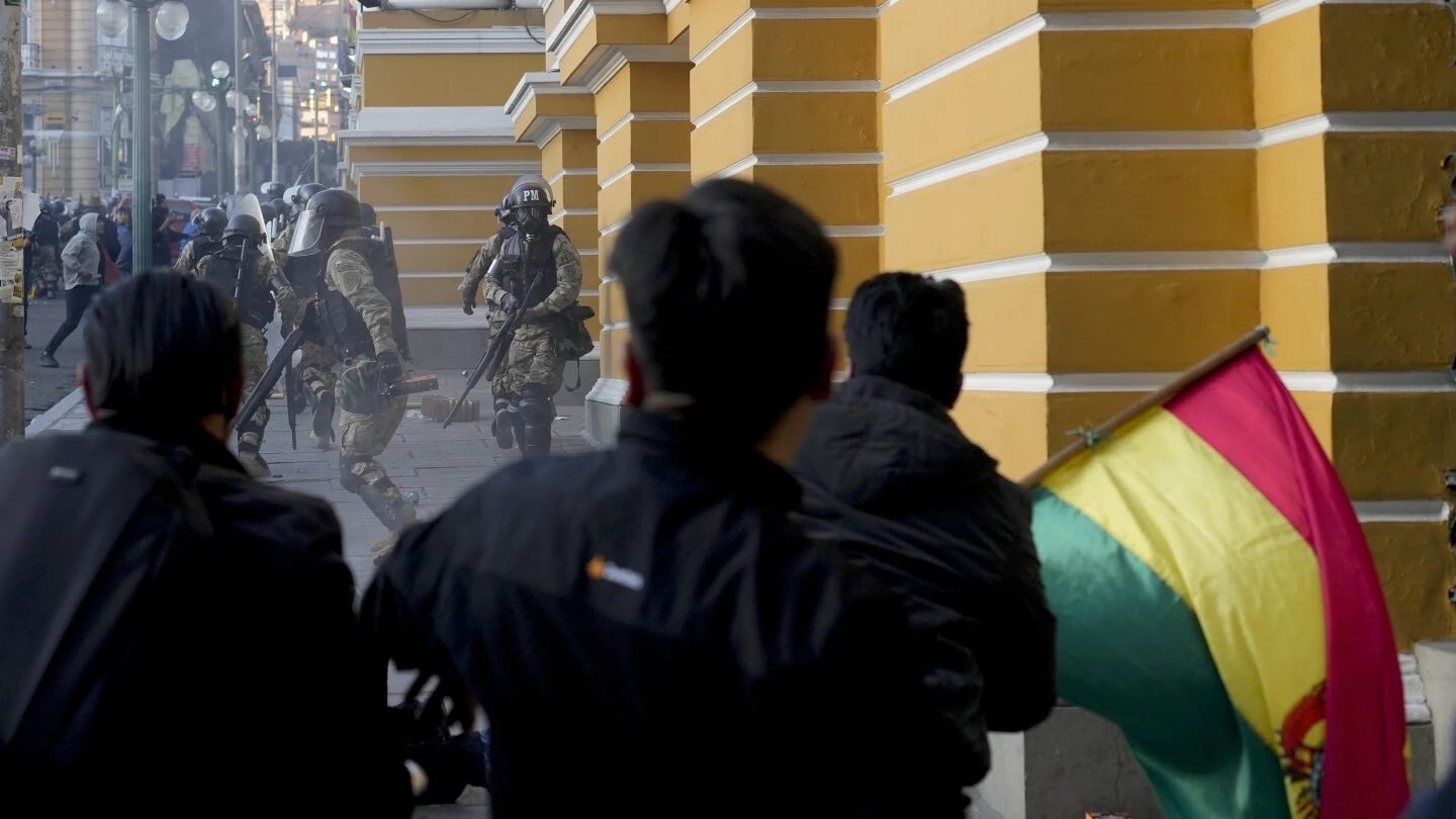 Military flees Bolivia government palace after coup attempt fails, general taken into custody