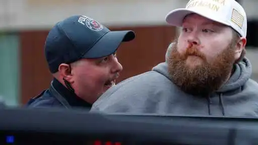 Witnesses: Man with gun threatened protesters in Lafayette anti-Trump rally; police: man was defending self