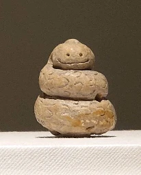 Happy snek sculpture, Thailand, 6th-11th century AD