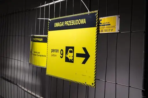 Attention! Construction works

Platform 9 (to the right)
Al. Prymasa Tysiąclecia (to the left, written only in Ukrainian)