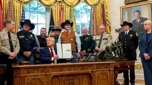 Trump Signs Executive Orders to Militarize Police, Punish Sanctuary Cities and Refugees