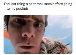 Image says "The last thing a neat rock sees before going into my pocket:" and then shows a close up picture of Jimm Carrey's face.