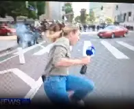 Officers shoot rubber bullet at reporter for "9 News Austraila" reporting in downtown LA