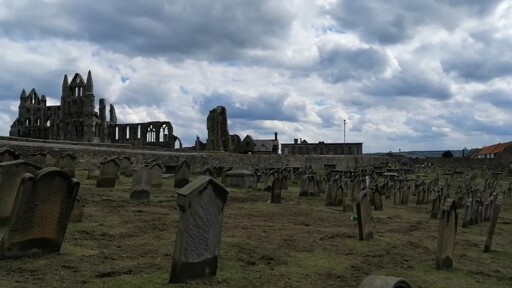 Graveyard of St Mary's Church with view of Whitby Abbey