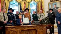 Trump Signs Executive Orders to Militarize Police, Punish Sanctuary Cities and Refugees