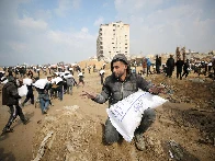 ‘Massacre’: Israel forces attack crowds waiting for aid in Gaza, killing 21