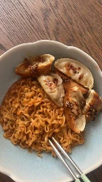 Ramen, chili oil and meat dumplings