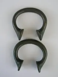 Two (bronze?) examples of Manilla money, worn around the wrist or arm, West Africa, 19th century AD