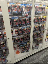 A shop display with Mens underwear locked behind glass.